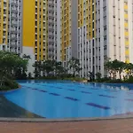 Homey 2BR Apartment @ Springlake Summarecon Bekasi By Travelio