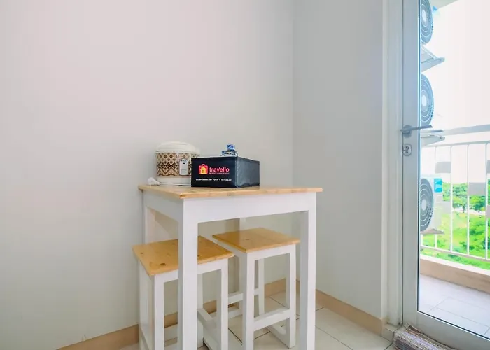 Homey 2BR Apartment @ Springlake Summarecon Bekasi By Travelio